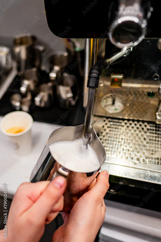 Barista skillfully steaming milk for a fresh cup of coffee, capturing the intricate details of coffee preparation Barista skillfully steaming milk for a fresh cup of coffee, capturing the intricate details of coffee preparation