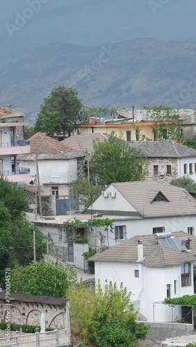 City of Gjirokaster in Southern Albania. Old Town is a UNESCO World Heritage Site. Closeup of Architectural Buildings. photo