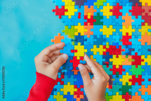 hands holding puzzle pieces
