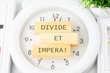 Latin quote Divide et impera meaning Divide and conquer. the best method of governing such a state is to incite and use hostility between its parts.