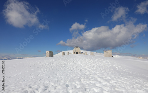 Pieve, TV, Italy - March 13, 2024: Military Ossuary Memorial of Monte Grappa and white snow