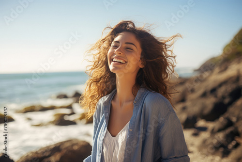 young beautiful woman enjoying at sea beach