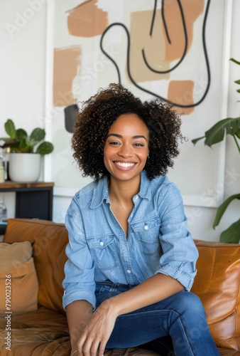 Woman Sitting on Couch in Living Room