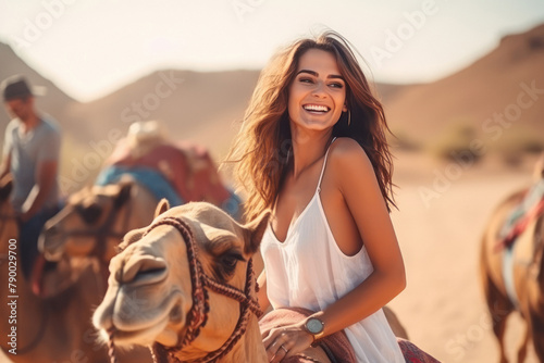 young woman having fun and enjoying with camel ride © Niks Ads