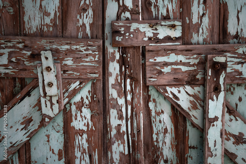 Close up of old barn door with flaking paint Close up of old barn door with flaking paint