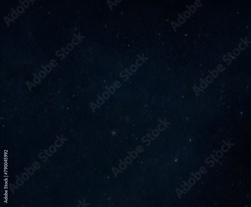 A night sky filled with countless stars against a dark background