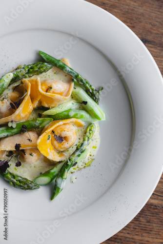 Tortellini with seafood and asparagus. Spring menu, restaurant.