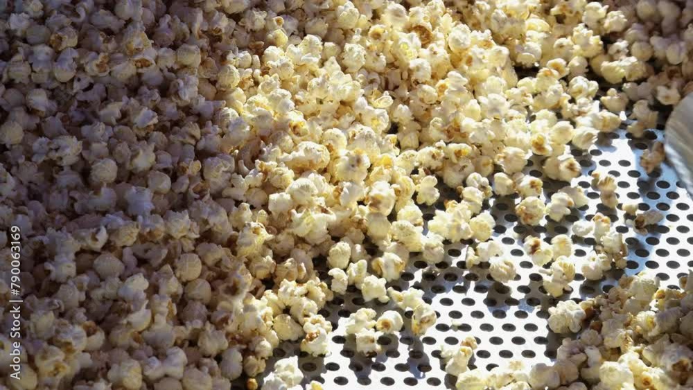 Fresh popcorn, made in an industrial popcorn machine. Fresh popcorn, made in an industrial popcorn machine.