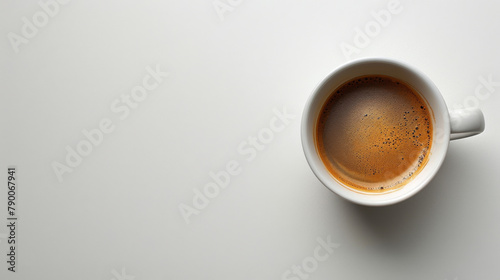 White coffee cup on light surface. Top view. Isolated on withe background. Room for copy space.	 photo