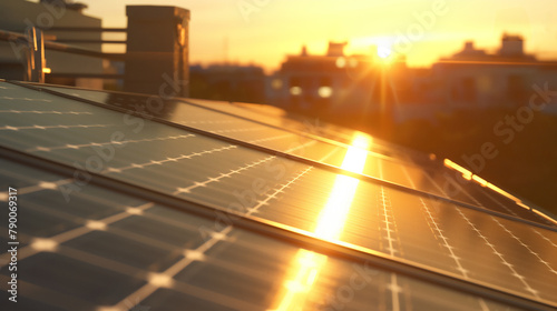 Solar panels on the roof of a residential urban area at sunset