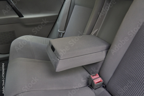 Car passenger back rear seats armrest in gray color