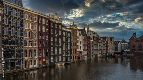 Traditional Amsterdam architecture on Damrak canal, Netherlands © Nabil