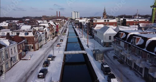 Snowy Aerial: Dutch Town Blanketed in Winter's Veil photo