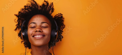 Young woman listening to music photo