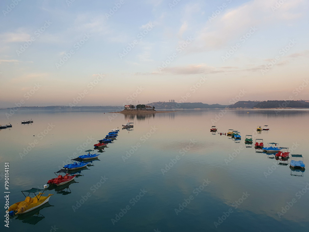 Fototapeta premium Fishing boats anchored on the lake shore