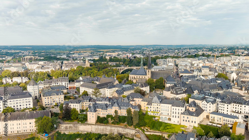 Luxembourg City, Luxembourg. Panoramic view of the historical part of Luxembourg city. The city is located in a deep valley of two rivers - Alzette and Petrus, Aerial View © nikitamaykov