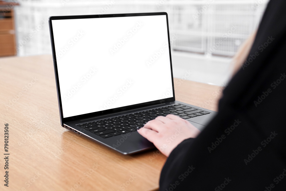 Young white woman working on computer with blank copy space screen on table in home office. close up female businesswoman hands typing text, surfing internet on modern laptop. mock up, front view Young white woman working on computer with blank copy space screen on table in home office. close up female businesswoman hands typing text, surfing internet on modern laptop. mock up, front view