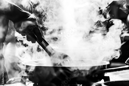 Chef preparing food in the kitchen, chef cooking. Black and White