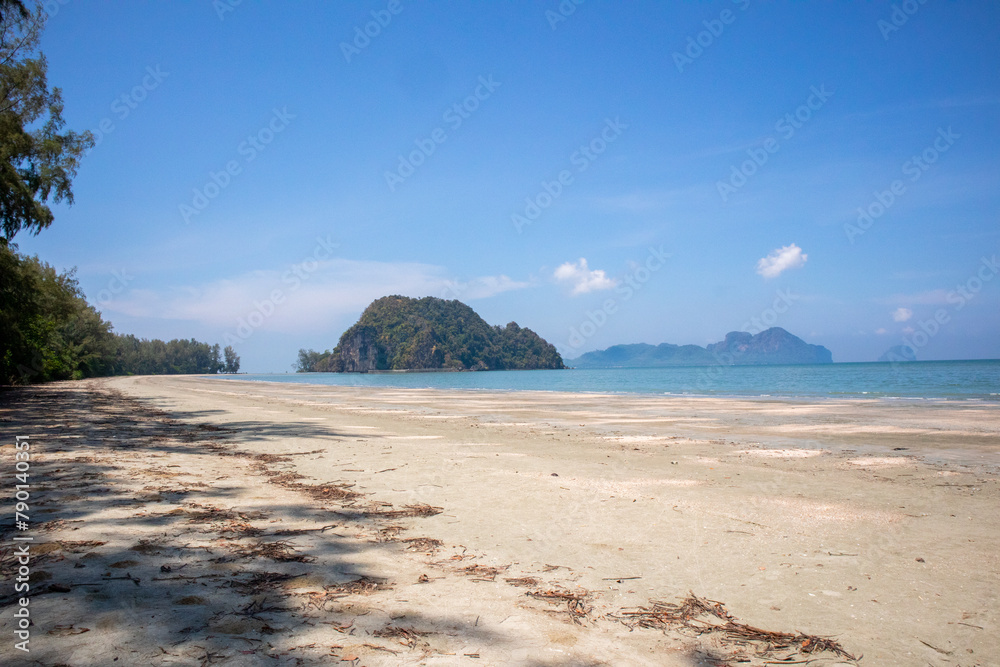 Sand and Sea on sunny day in Chao Mai Beach at Trang, Thailand