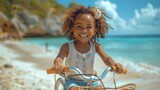 A little African American girl with curly hair rides her bike on the sandy beach, enjoying the ocean breeze and the warmth of the sun.