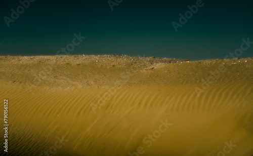 an imaginary desert landscape reminiscent of the arid and surreal atmosphere of the planet Mars