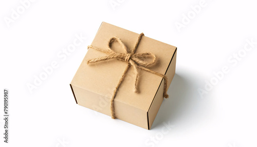 a cardboard gift box tied with a neat jute string bow