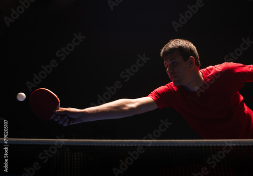 Teenager play  table tennis in on white background