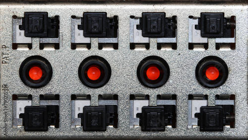 red led and switch connections on rectangular metal circuit panel 