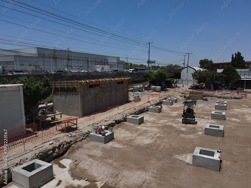 Fototapeta premium Сity development. Aerial view from drone, construction, Building construction site.