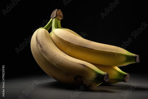 Fresh banana bunch on dark background