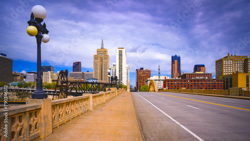 St. Paul City in Minnesota, skyline, skyscrapers, and St. Paul City Hall over the Robert Street Bridge and Mississippi River in the Upper Midwestern United States photo