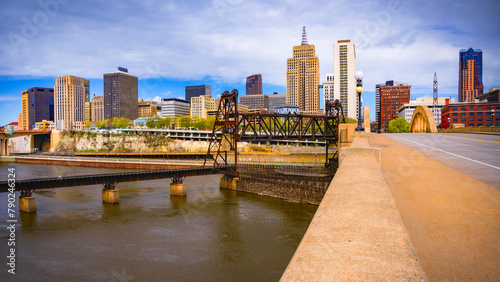 St. Paul City in Minnesota, skyline, skyscrapers, and St. Paul City Hall over the Robert Street Bridge and Mississippi River in the Upper Midwestern United States #790246324