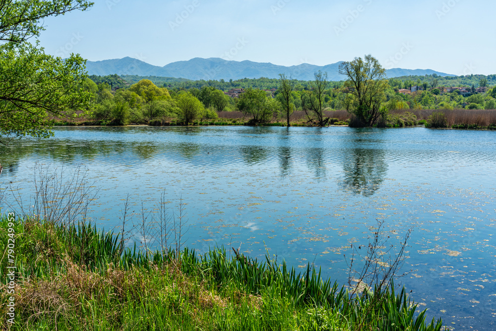 Idyllic view at Posta Fibreno Lake Natural Reserve. In the province of Frosinone, Lazio, Italy. Idyllic view at Posta Fibreno Lake Natural Reserve. In the province of Frosinone, Lazio, Italy.