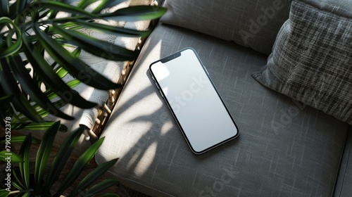 IPhone15 blank mockup, flat on the chair, top down view photo