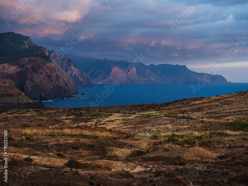 Cape Ponta de Sao Lourenco, Canical, East coast of Madeira Island, Portugal. Scenic landscape of Atlantic Ocean, rocks and cllifs and cloudy sunrise sky. Views from popular hiking trail PR8