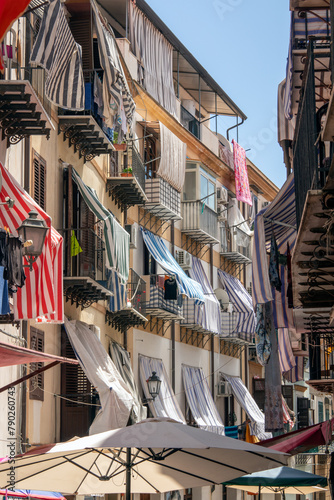 Old blind covered balconies in the heart of Palermo's back streets
