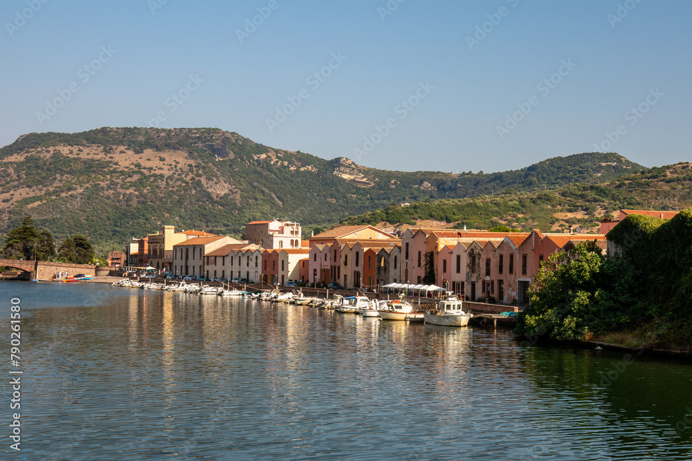 The Colourful Houses and boats lining the banks of the River Tema,in Bosa,  on Sardinia