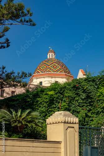 Colourful tiled dome of an old church in Alghero, Sardinia