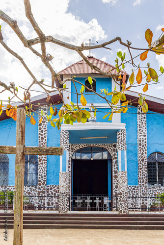 Littel blue church in El Castillo village along the San Juan river in Nicaragua photo