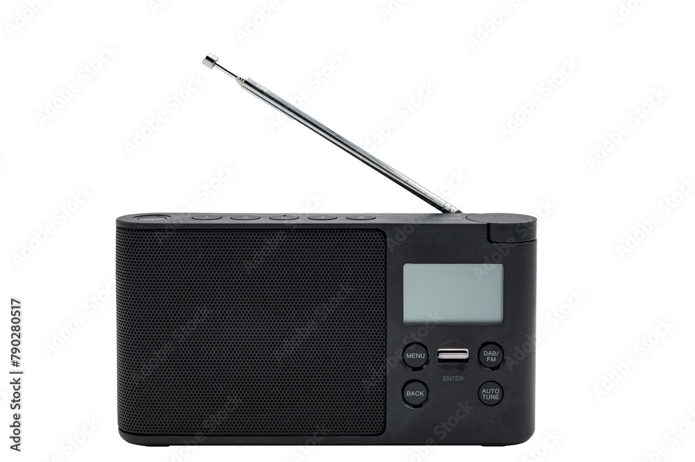 Detail of a small black battery-powered portable radio on a white background. It is a radio with folding antenna with FM, AM, DAB, DAB+, RDS reception and a screen Detail of a small black battery-powered portable radio on a white background. It is a radio with folding antenna with FM, AM, DAB, DAB+, RDS reception and a screen