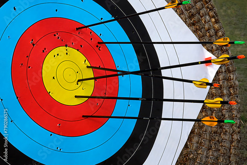 Konstfotografi Archery target with colorful rings and arrows, precision sport concept