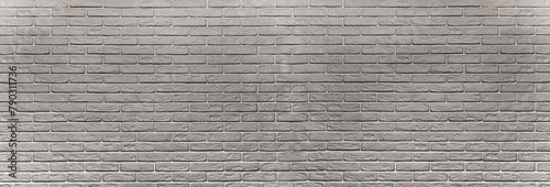 a gray textured brick wall. white background photo