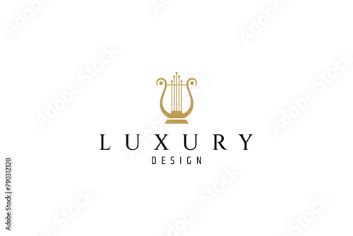 Luxury golden harp or lyre logo concept photo