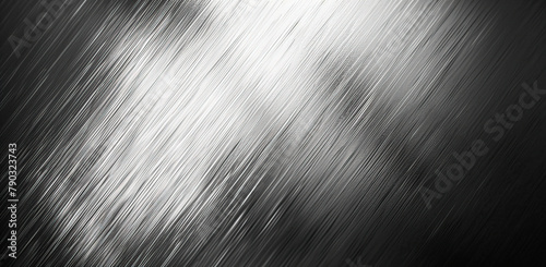 Stainless steel surface with visible scratches and irregularities, detailed monochrome texture