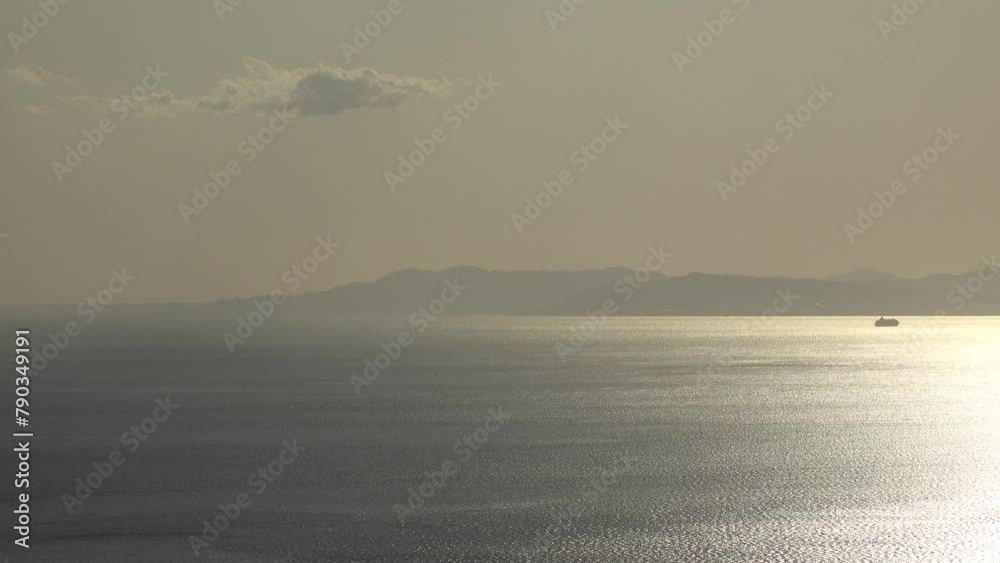 NUMAZU, SHIZUOKA, JAPAN - MARCH 2024 : Aerial high angle view of Suruga bay (Suruga wan) near Numazu city in sunset. NUMAZU, SHIZUOKA, JAPAN - MARCH 2024 : Aerial high angle view of Suruga bay (Suruga wan) near Numazu city in sunset.