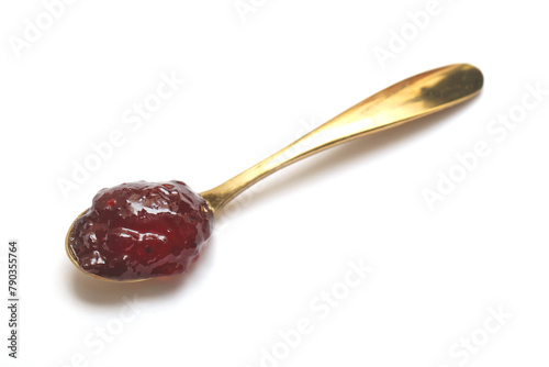 jam speard on spoon isolate white background