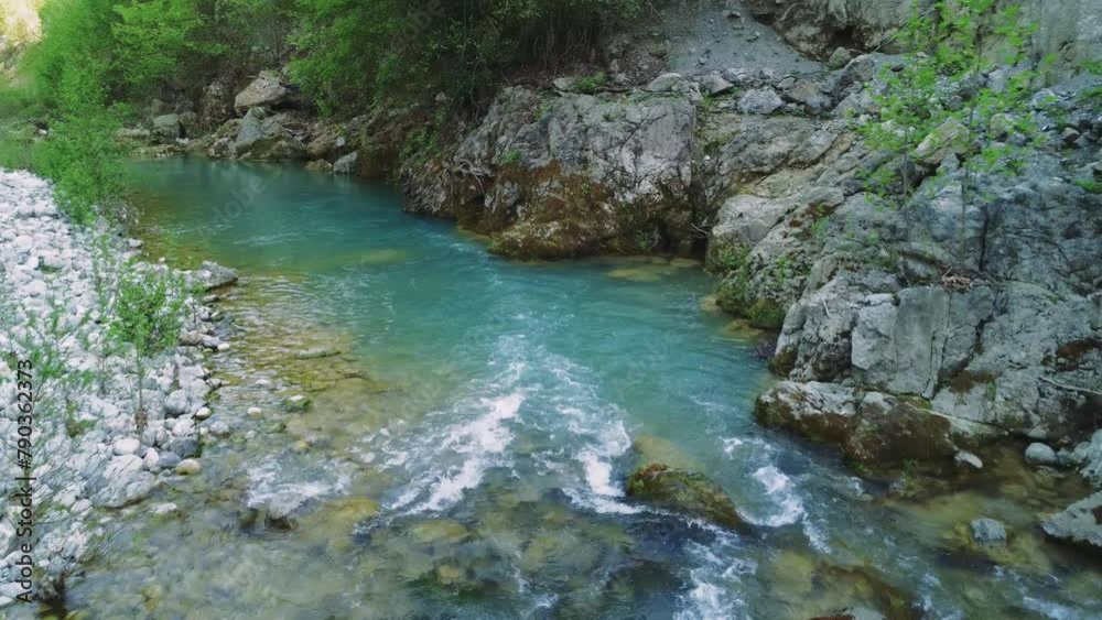 Drone captures rapid, stream in mountainous terrain. Low aerial view of rapid, stream flowing over rocks. Footage shows secluded rapid, stream ideal for adventurers Drone captures rapid, stream in mountainous terrain. Low aerial view of rapid, stream flowing over rocks. Footage shows secluded rapid, stream ideal for adventurers