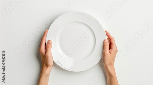 Top view human hands holding an empty white plate on a white background. AI generated image