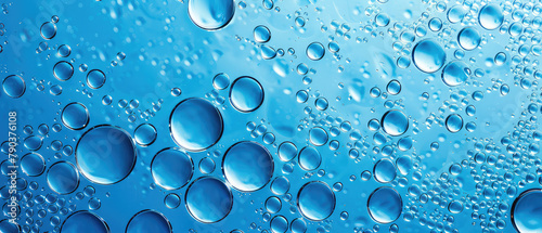 Blue water bubbles closeup on clear background