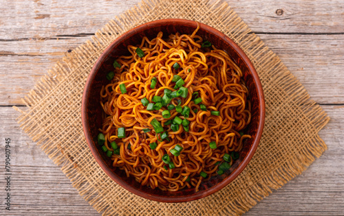 Fried Instant noodles with green onion and soy sauce , traditional asian food